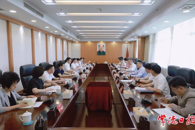 罗毅君与湖南电信万鹏一行座谈