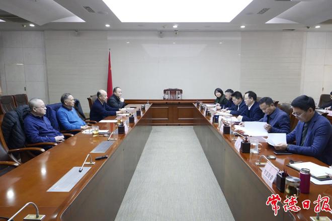 周振宇会见海南京粮控股股份有限公司王春立一行